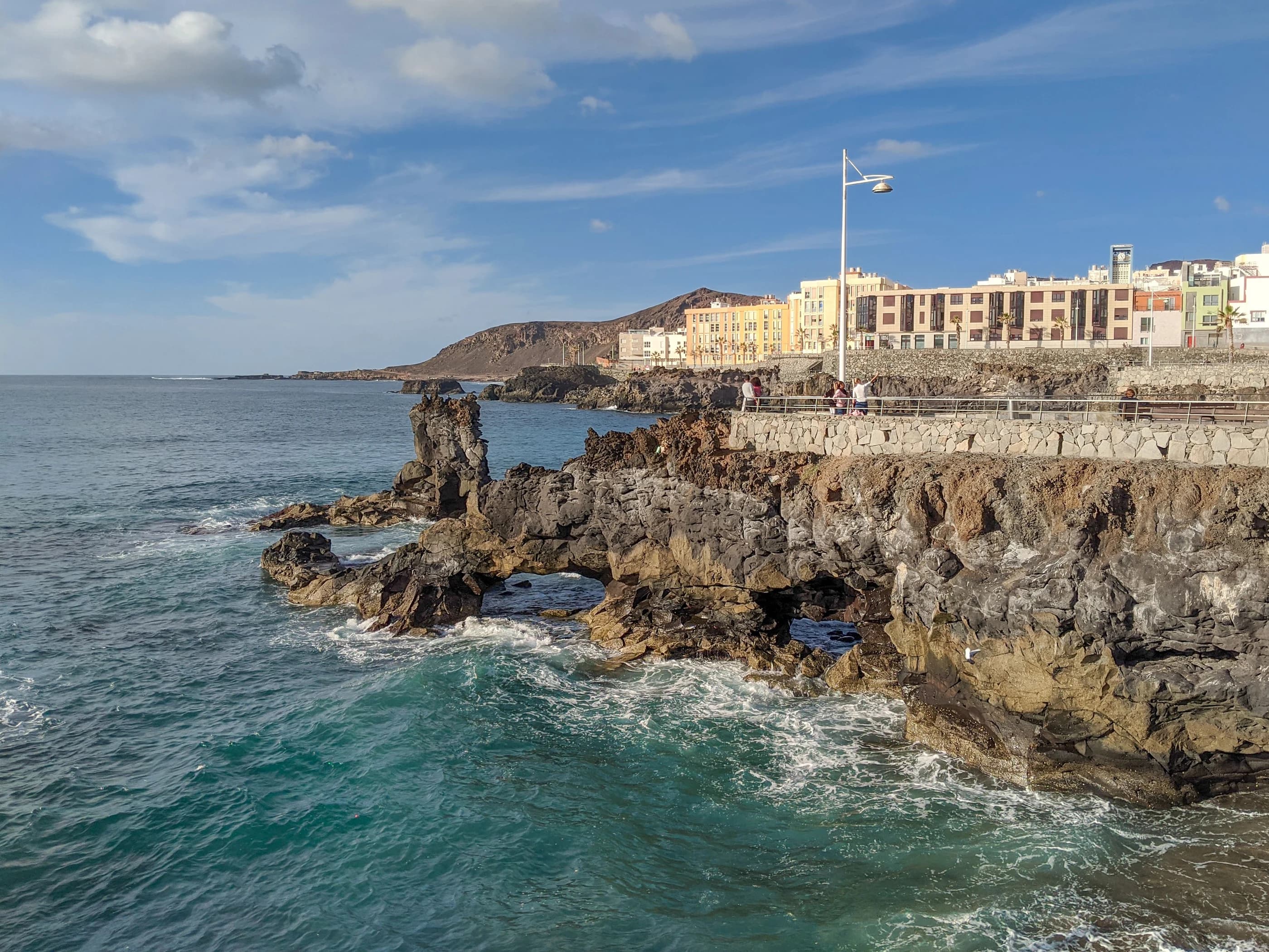 Rocky shoreline and promenade in Las Palmas